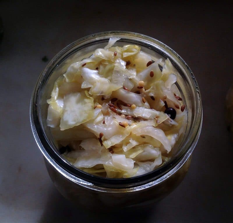 top view of an opened jar of sauerkraut