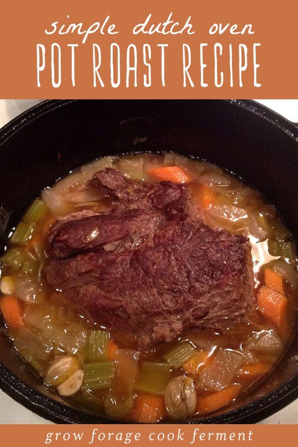 Pot roast cooked in a dutch oven with vegetables.