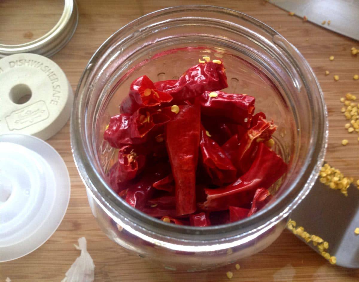 dried peppers in a jar to make hot sauce