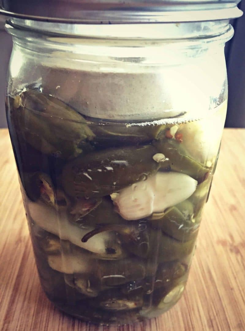 chilis in a jar after fermenting