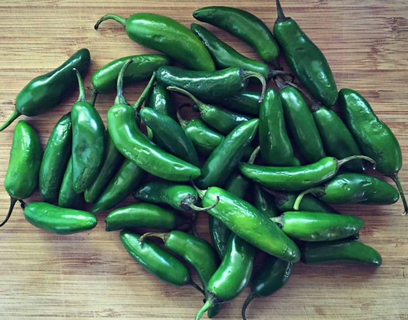 jalapenos on a cutting board