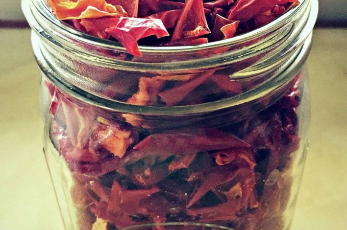 Jar of dehydrated red peppers.