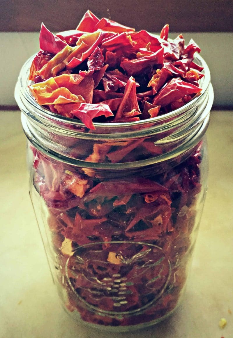 Jar of dehydrated red peppers. 