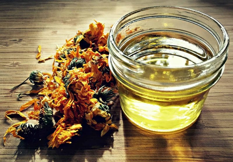 calendula oil with dried calendula flowers