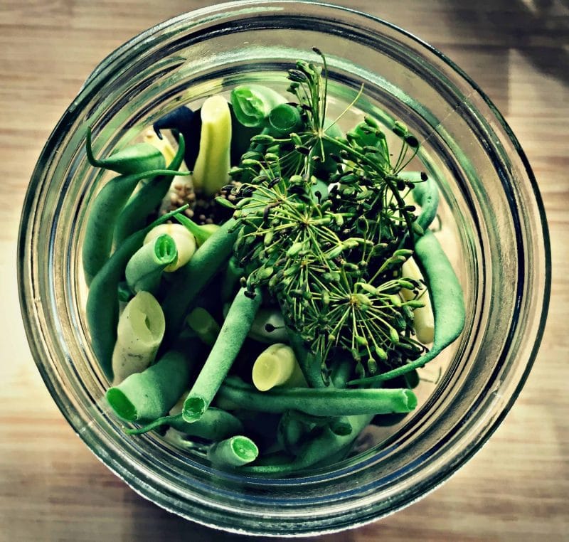 top view of green beans in a jar