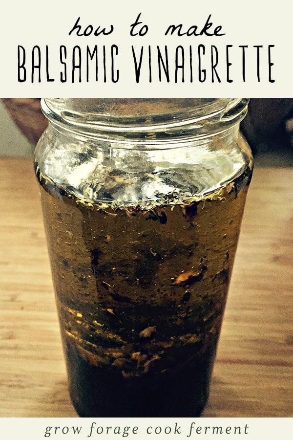 A glass jar of homemade balsamic vinaigrette.