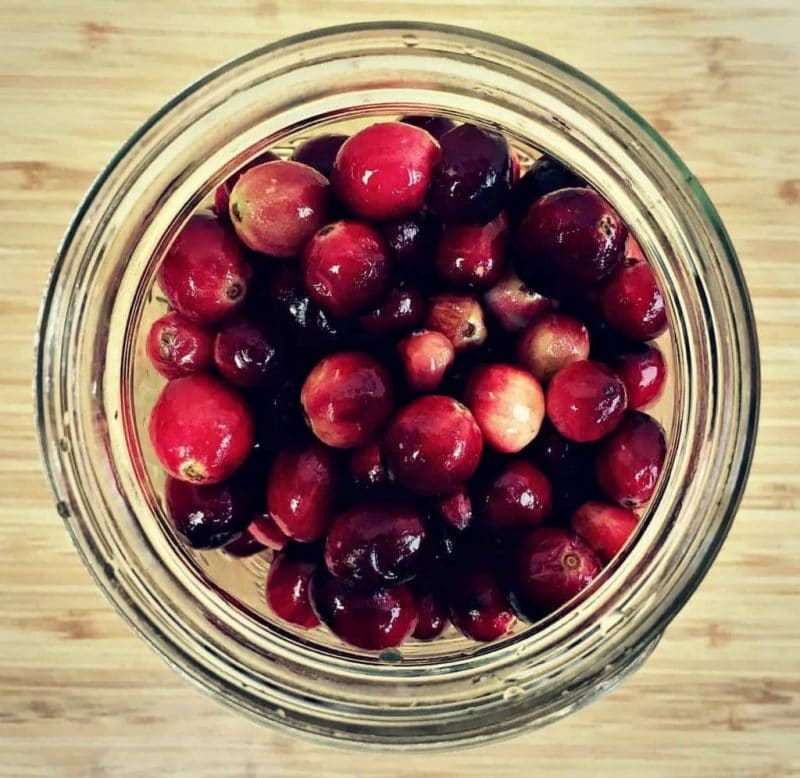 mashed cranberries in a quart jar