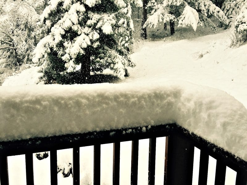 snow on railing