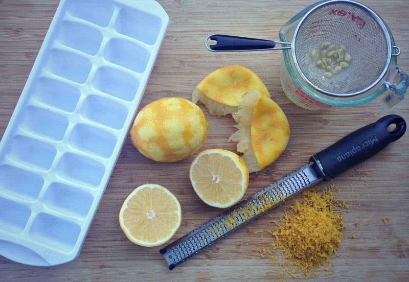 juicing and zesting lemons for freezing