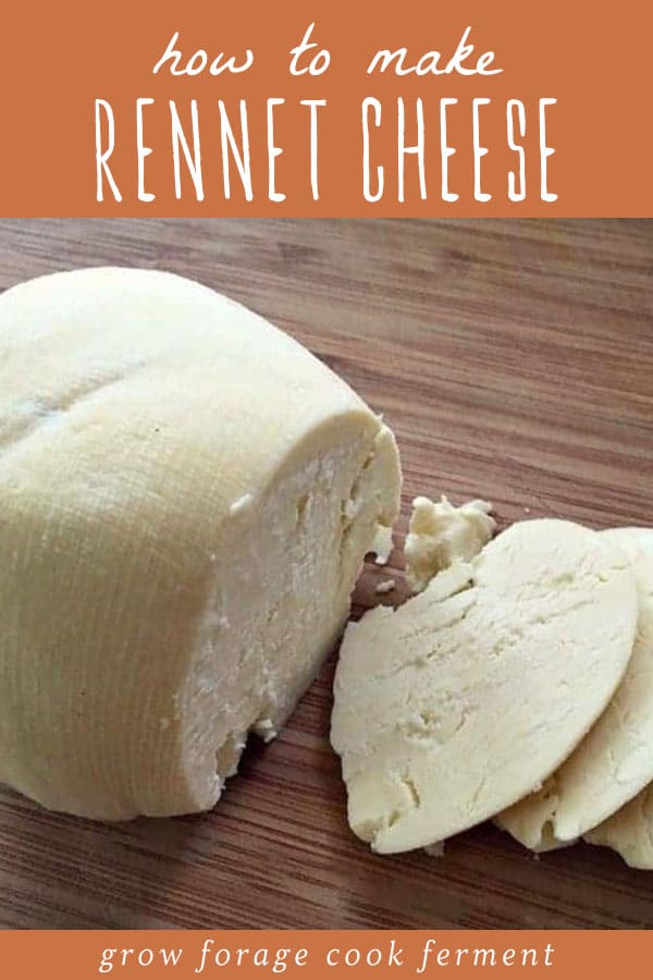 Slices of homemade rennet cheese on a cutting board.