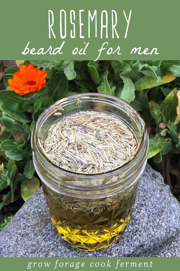 A jar of homemade rosemary beard oil.