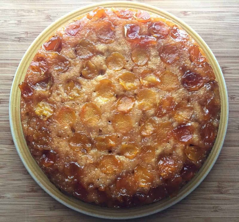 plum upside down cake on a plate