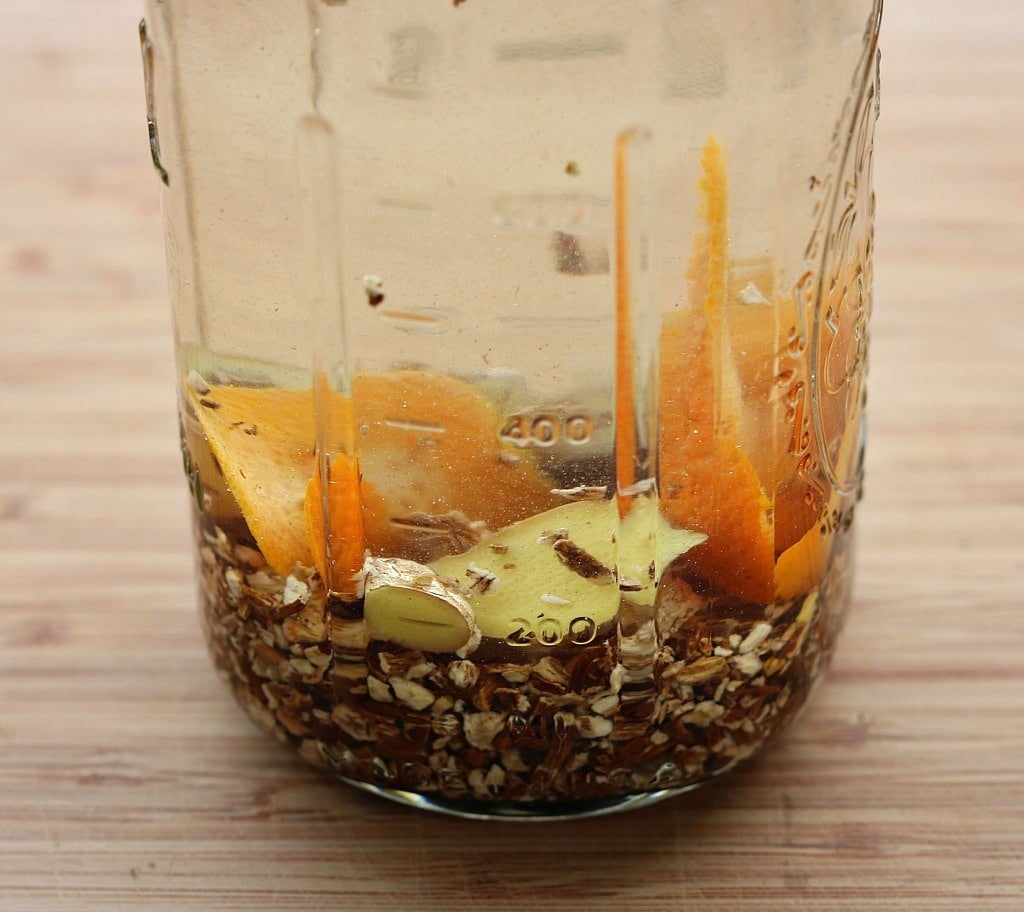 Dandelion roots being infused in vodka