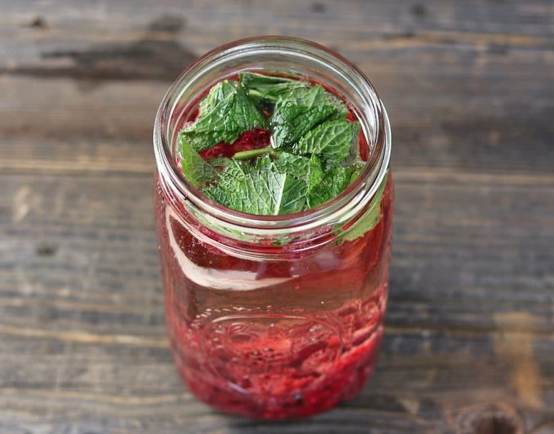 mint and raspberries infusing in wine