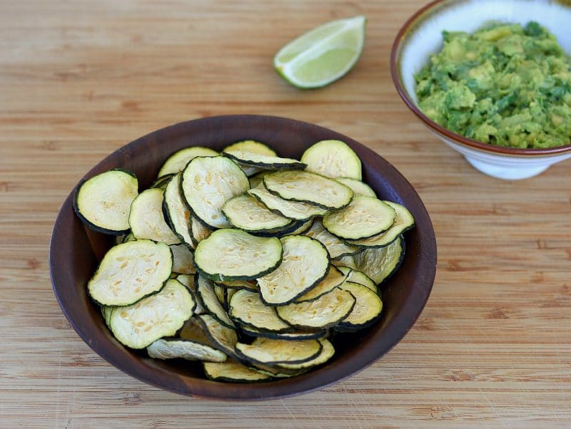 a bowl of dehydrated zucchini chips