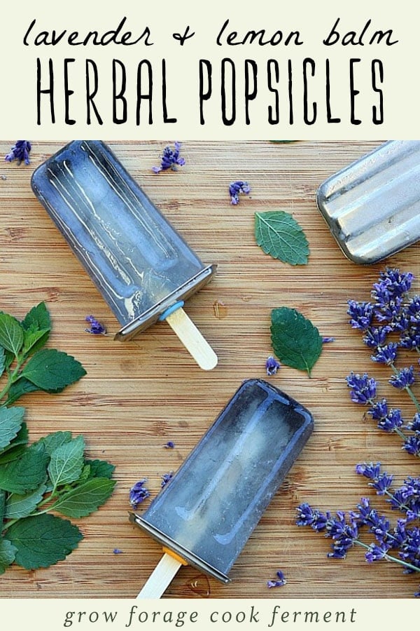 Lavender and lemon balm herbal popsicles on a wood background.