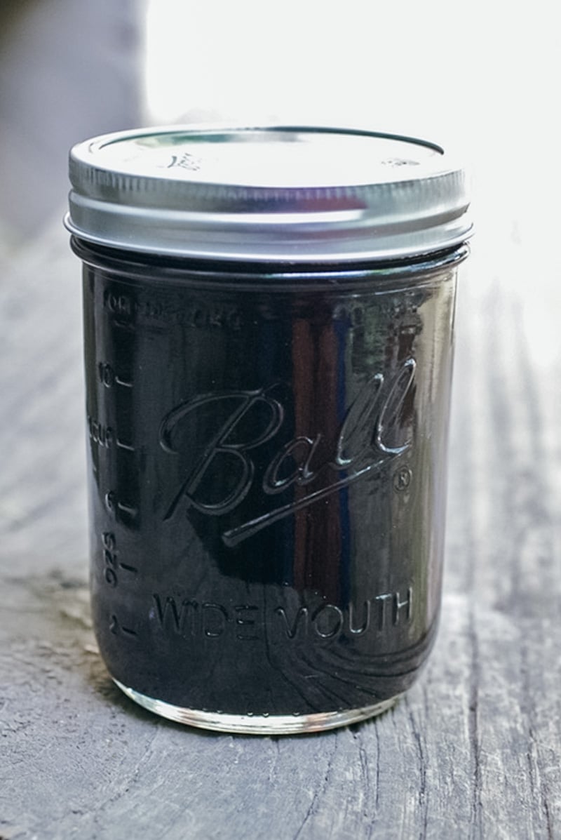 a canning jar of fresh maple syrup