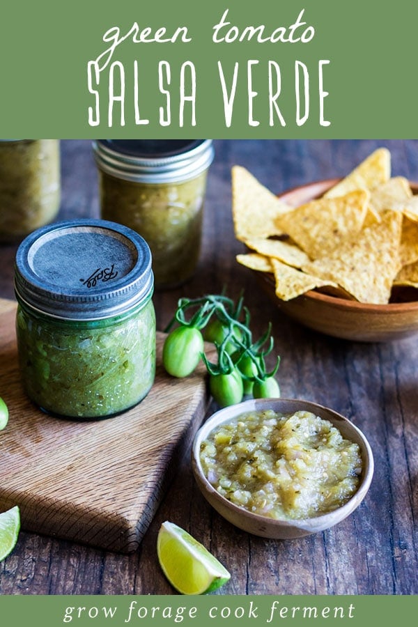 a mason jar and a bowl of green tomato salsa verde