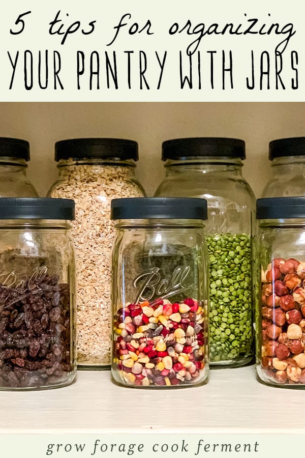 a pantry shelf with ball jars filled with dry goods