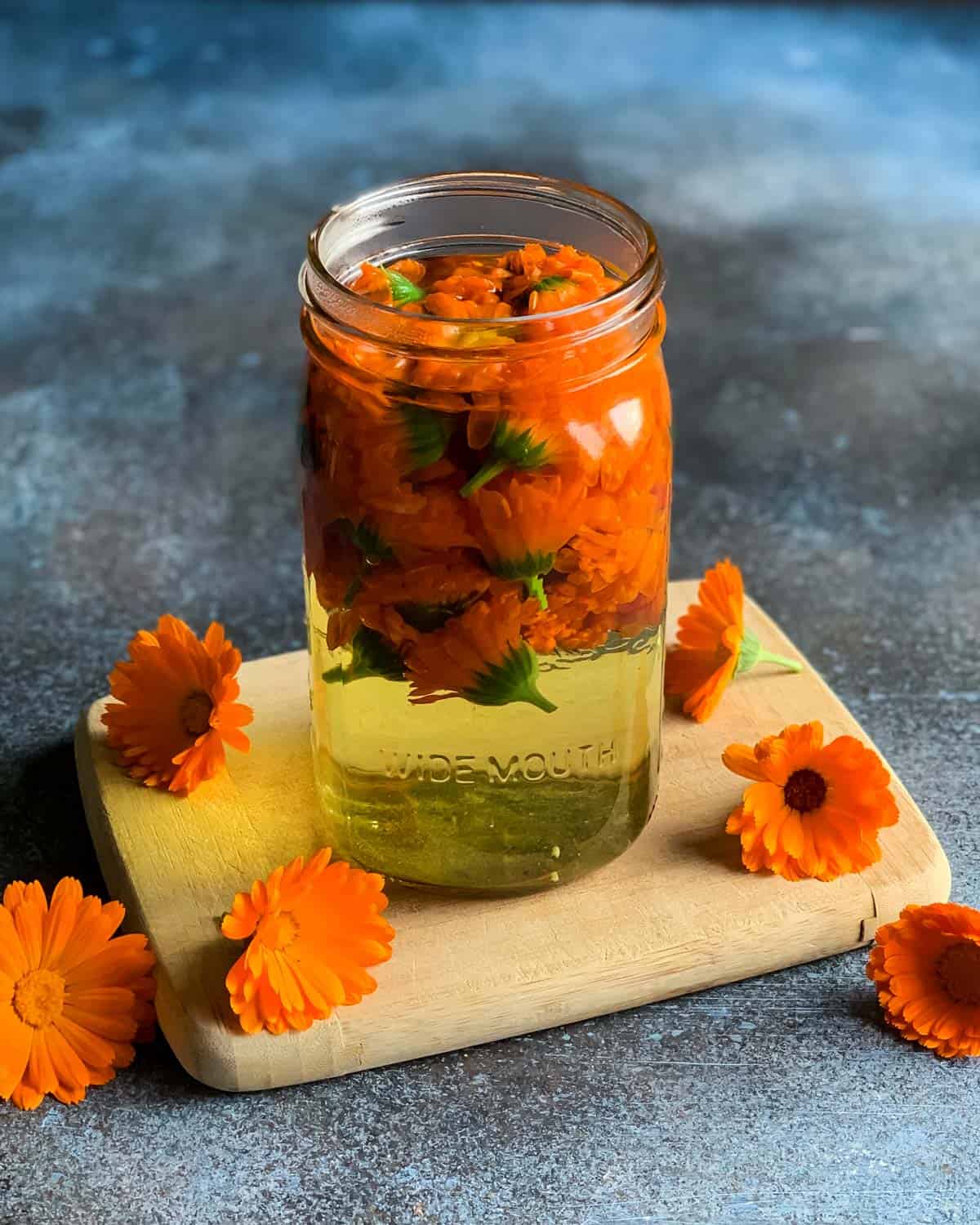 a quart jar of fresh calendula tea