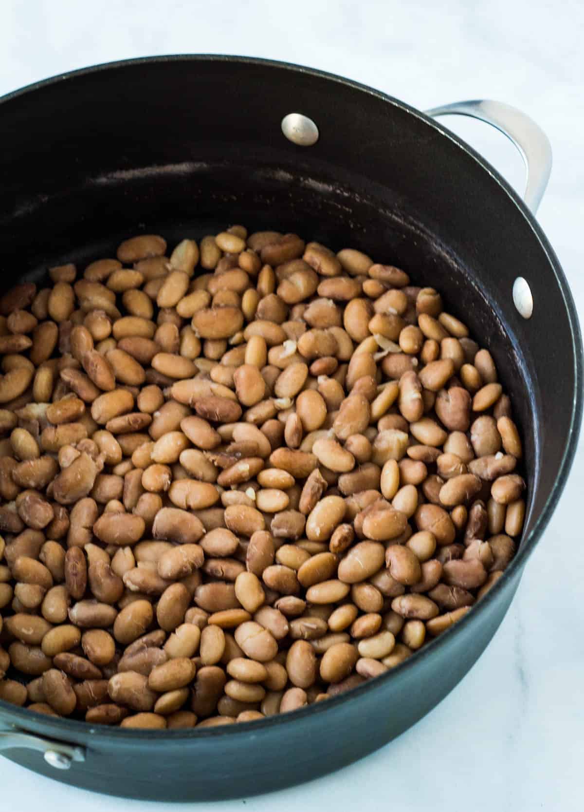 cooked pinto beans in a pot