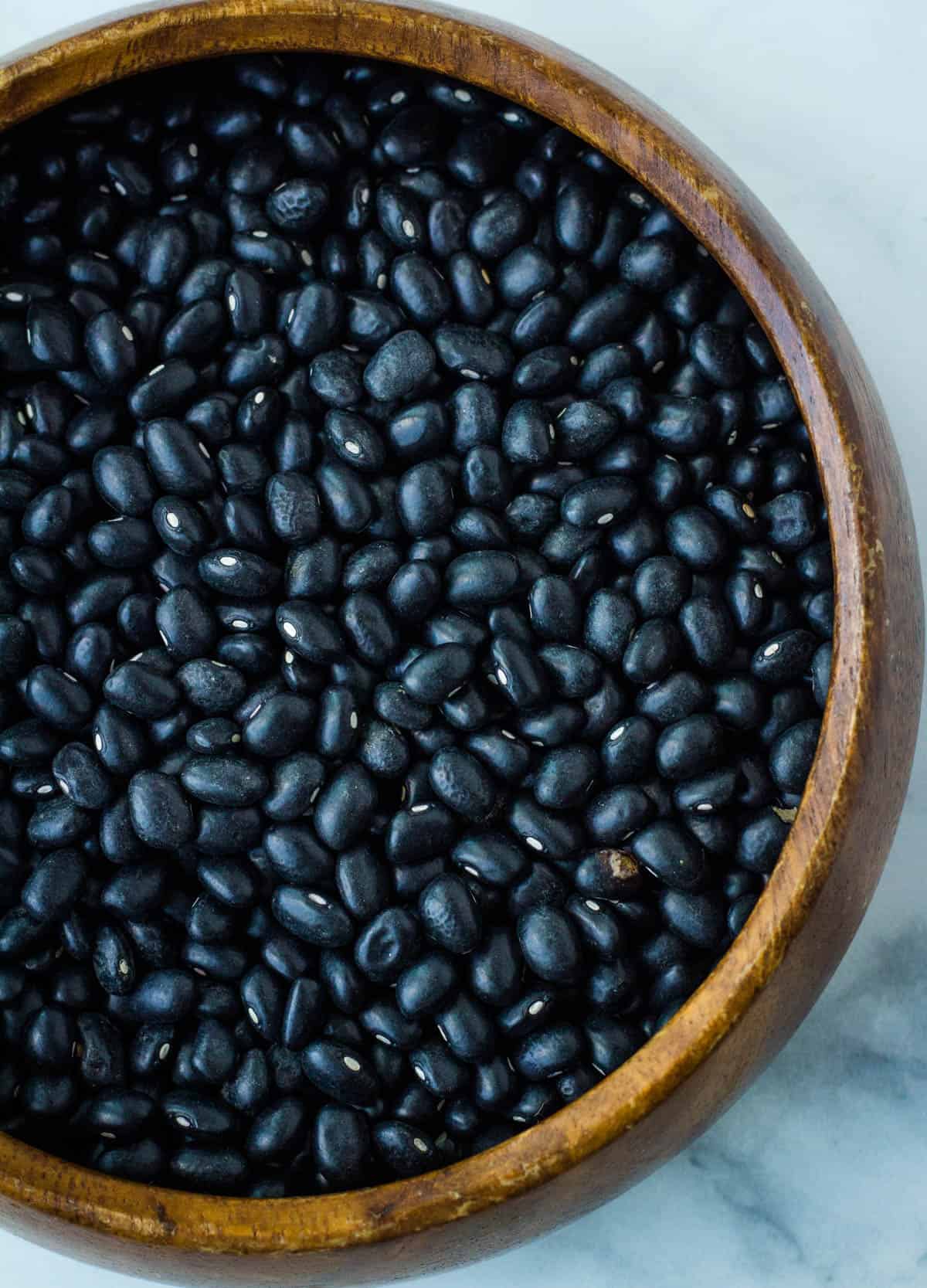 a bowl of dried black beans