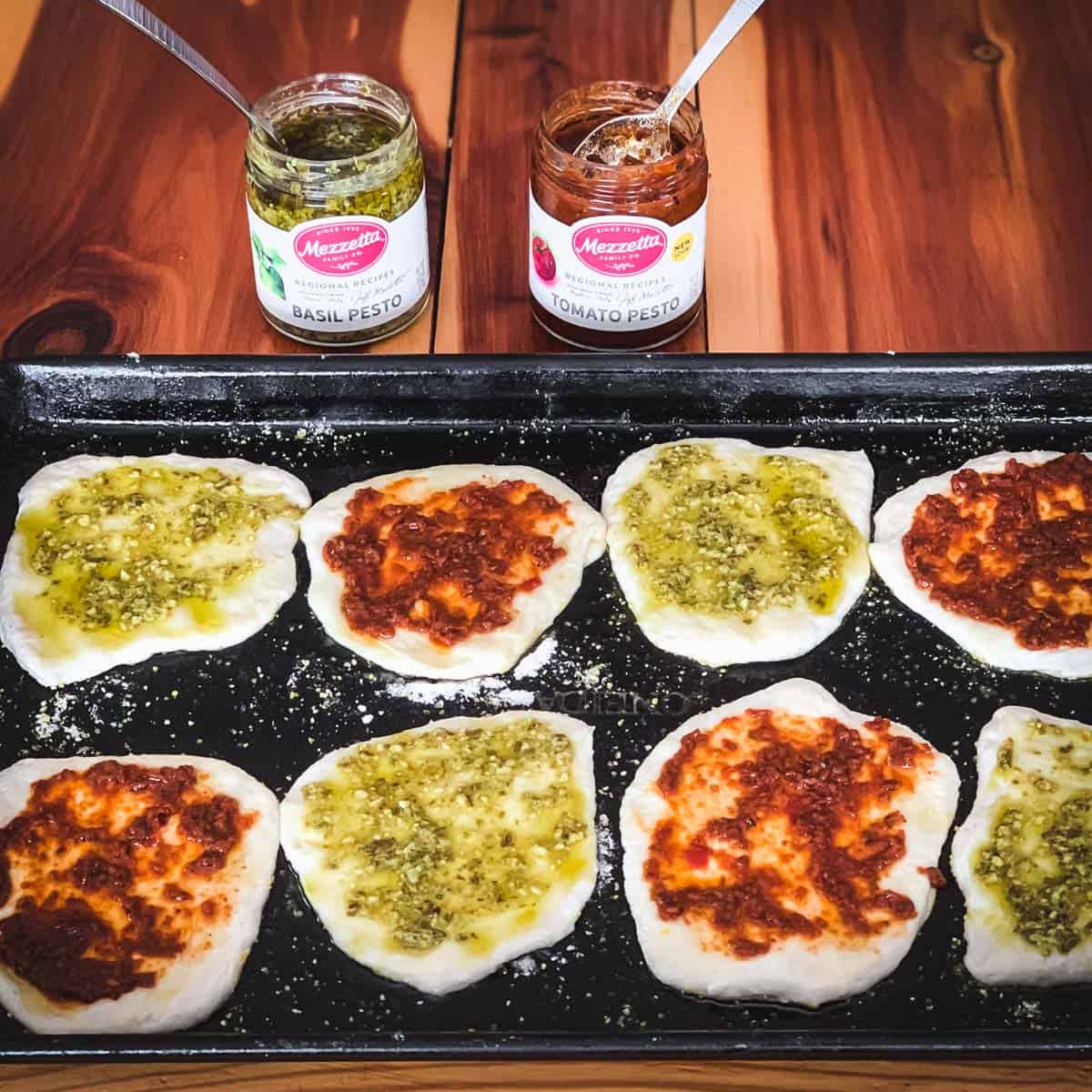 mini sourdough pizza doughs with pesto