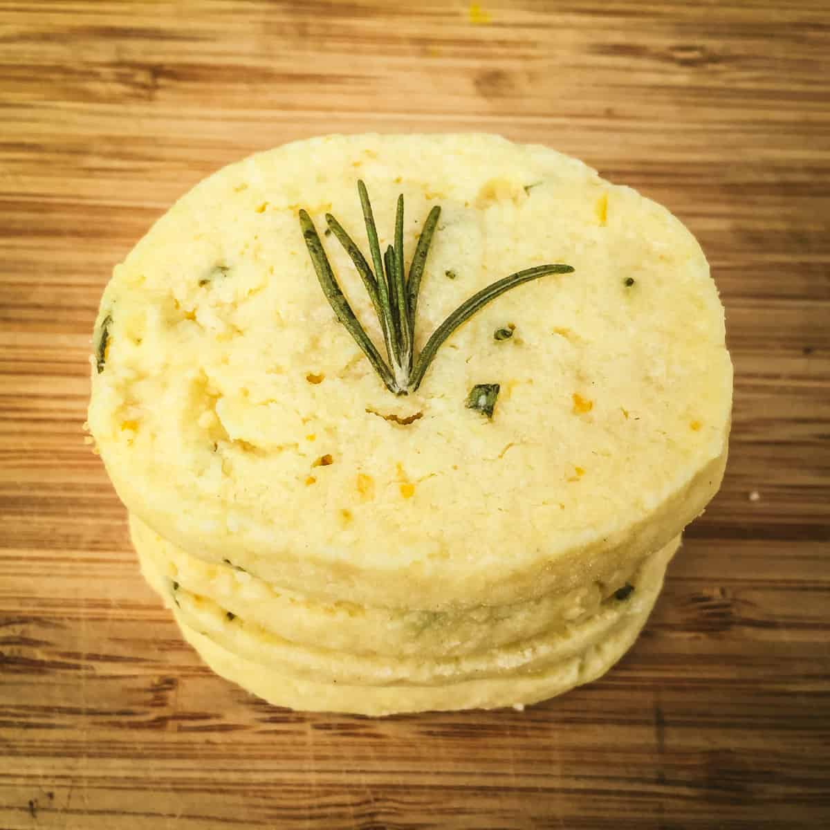 a stack of lemon and rosemary shortbread cookies