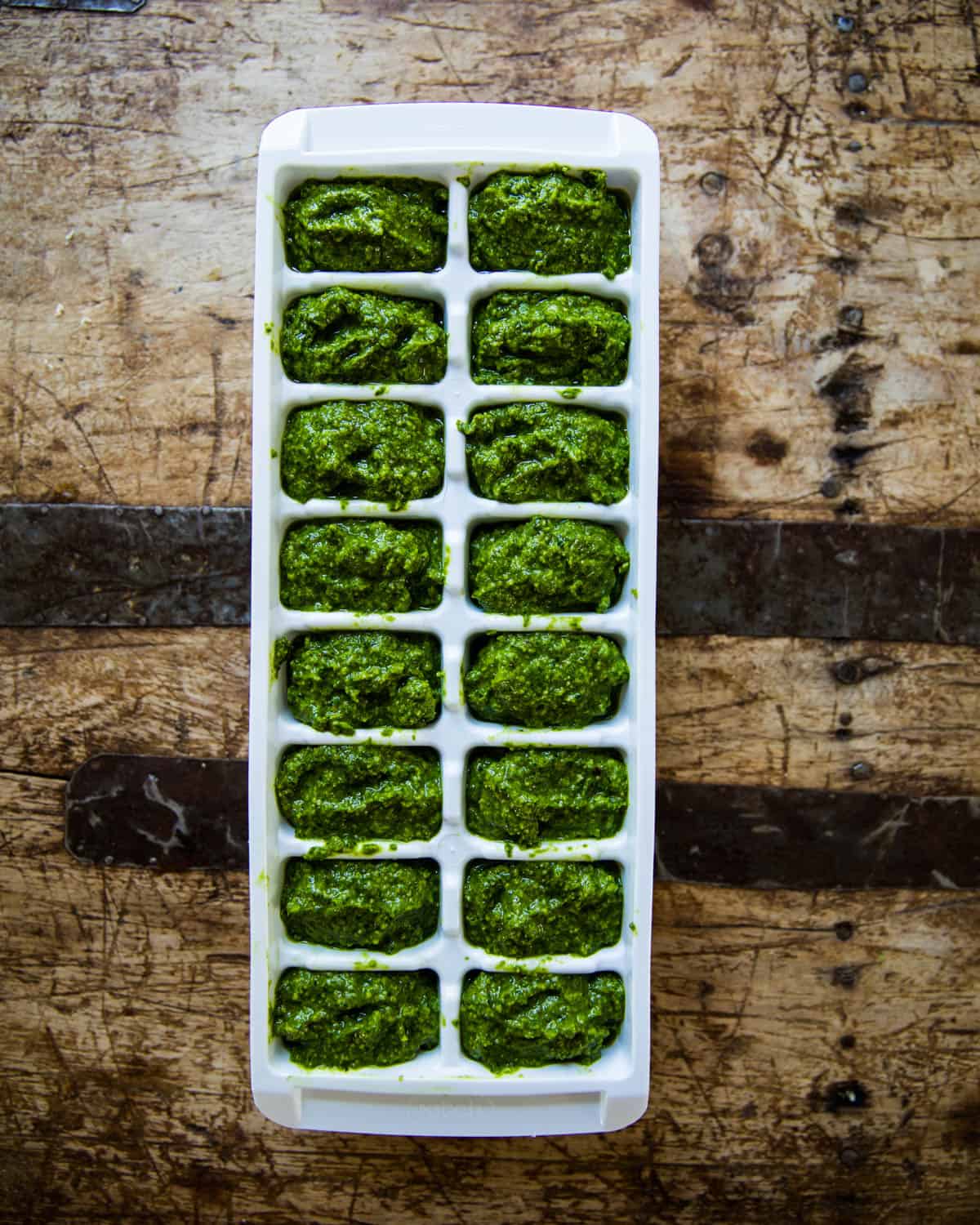 ramp pesto in an ice cube tray to freeze