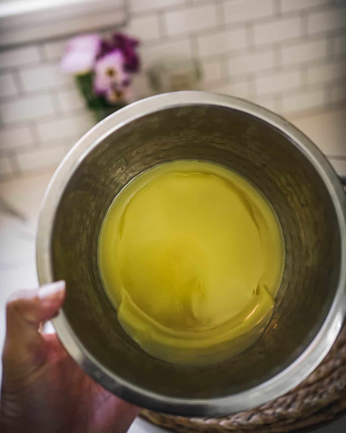 Bowl removed from boiler to cool on counter. 