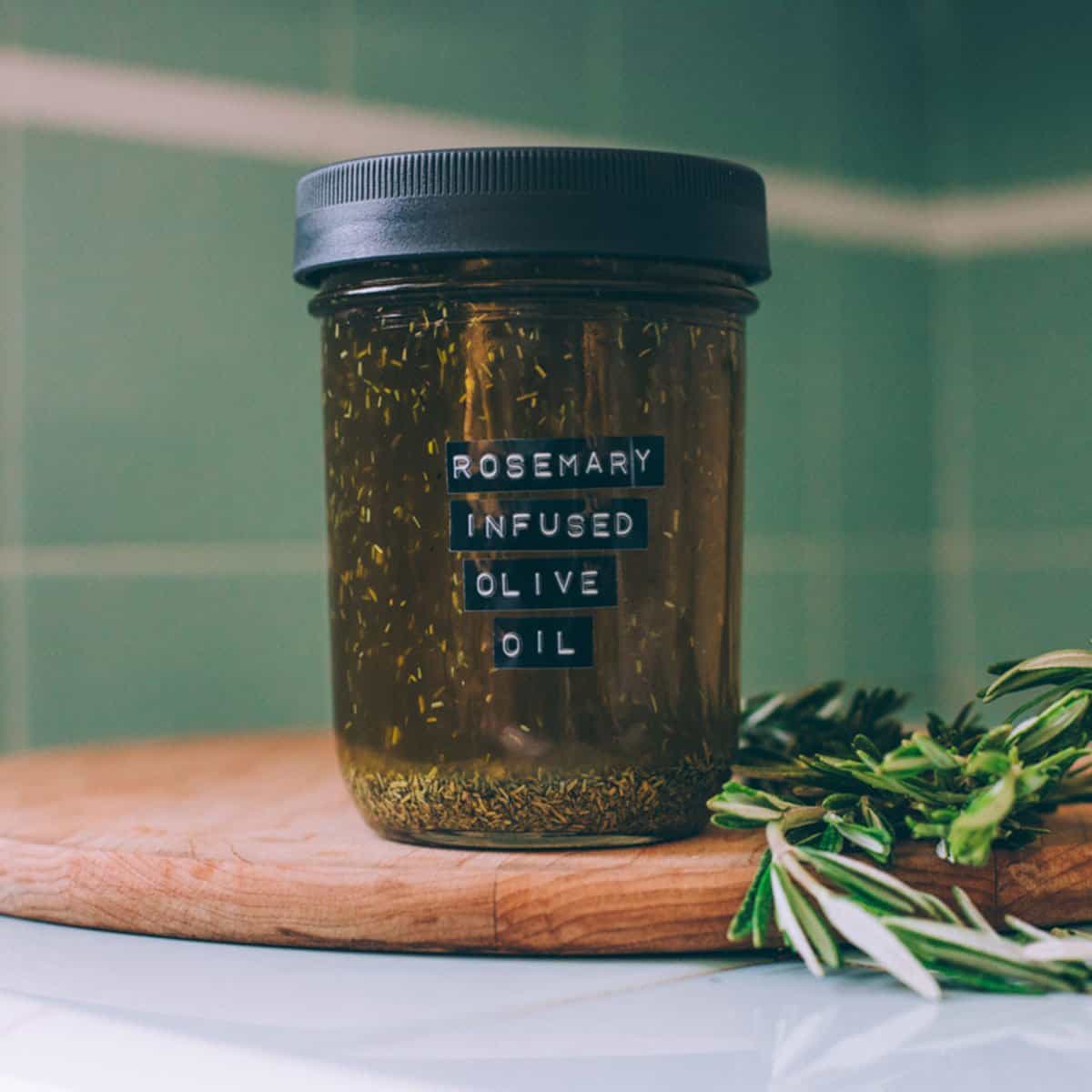 a jar of rosemary infused oil