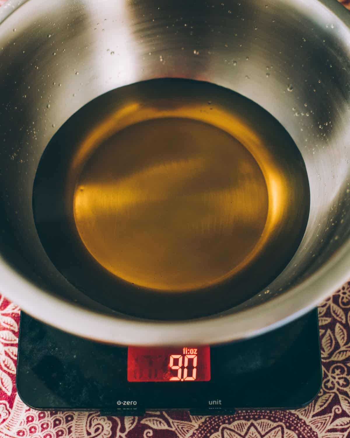 weighing the oils on a kitchen scale