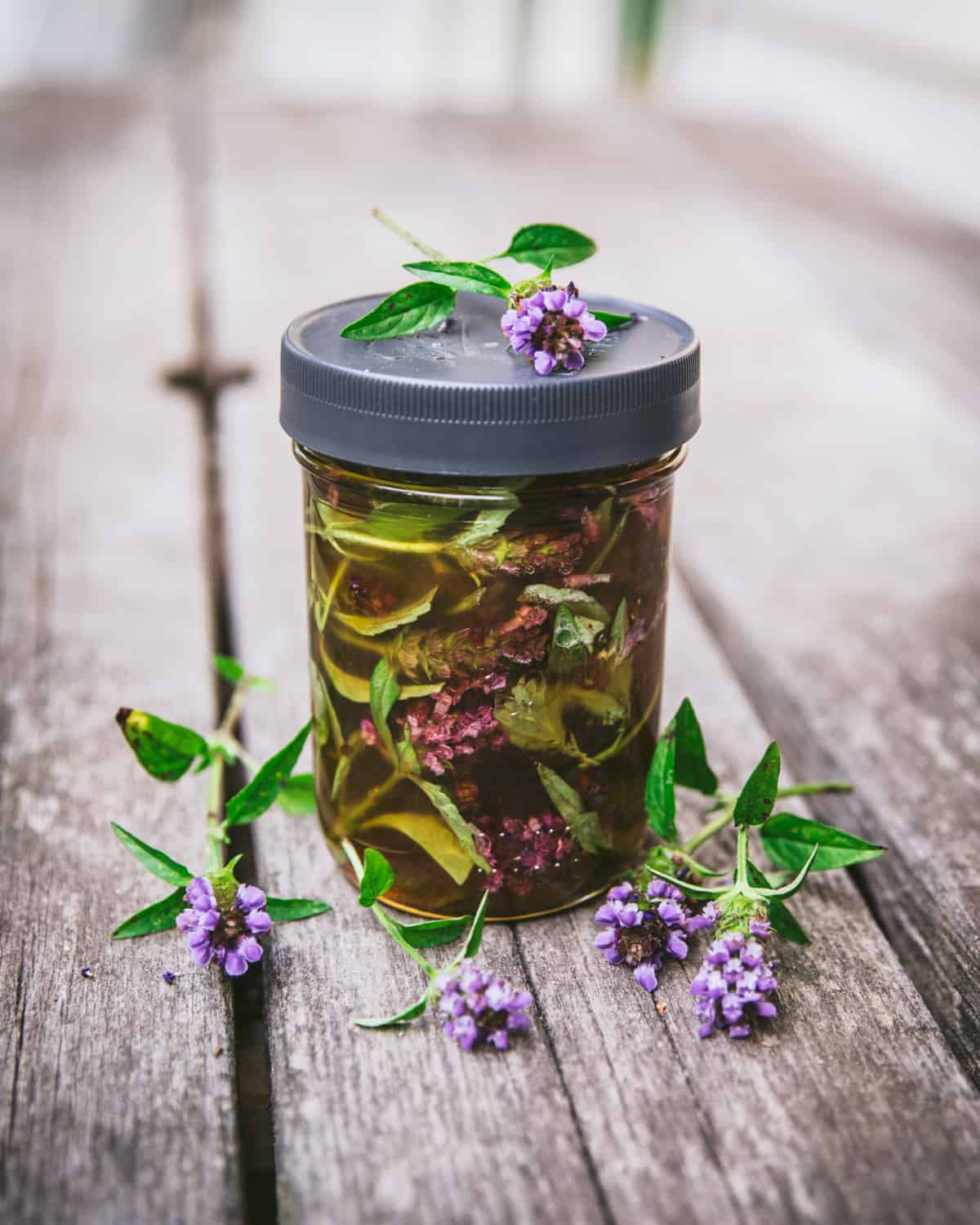 Jar with lid filled with self-heal oxymel. 