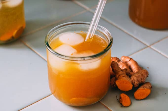 Fermented turmeric soda in a glass.