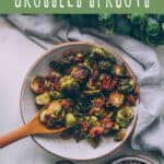 oven roasted brussels sprouts with bacon. maple syrup, and pecans