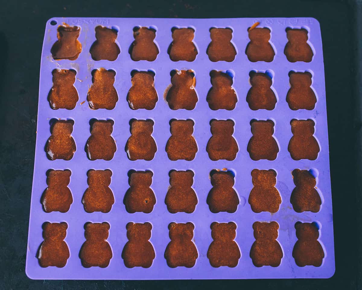 Gummy liquid in each bear mold, ready to refrigerate. 