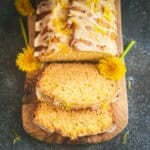 Dandelion bread, partially sliced.