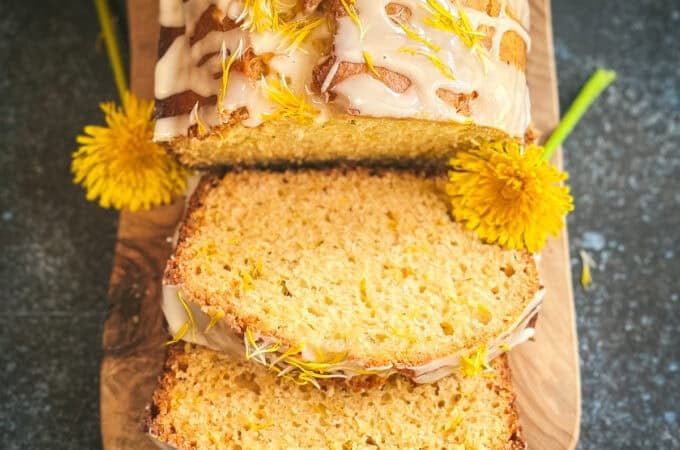 Dandelion bread, partially sliced.