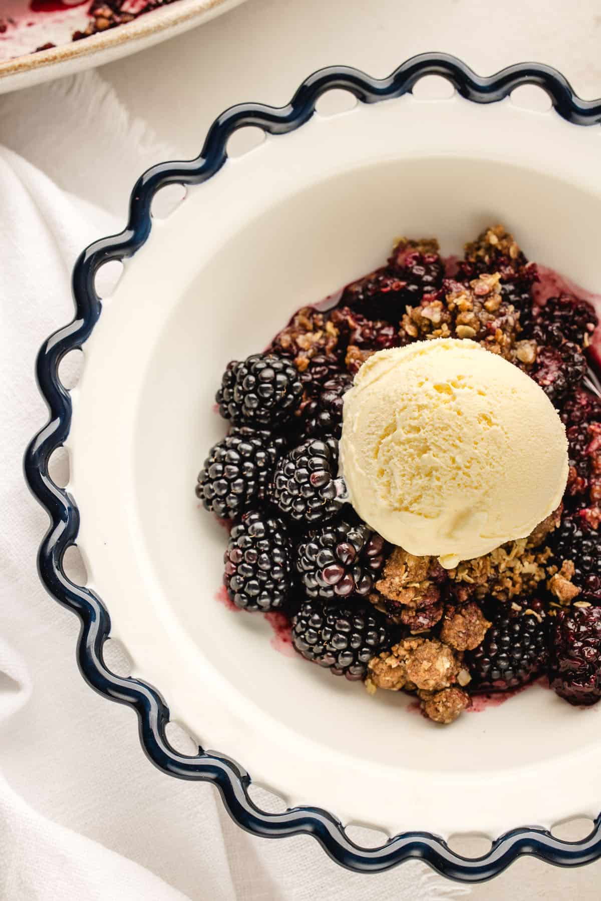 Blackberry crisp with ice cream. 